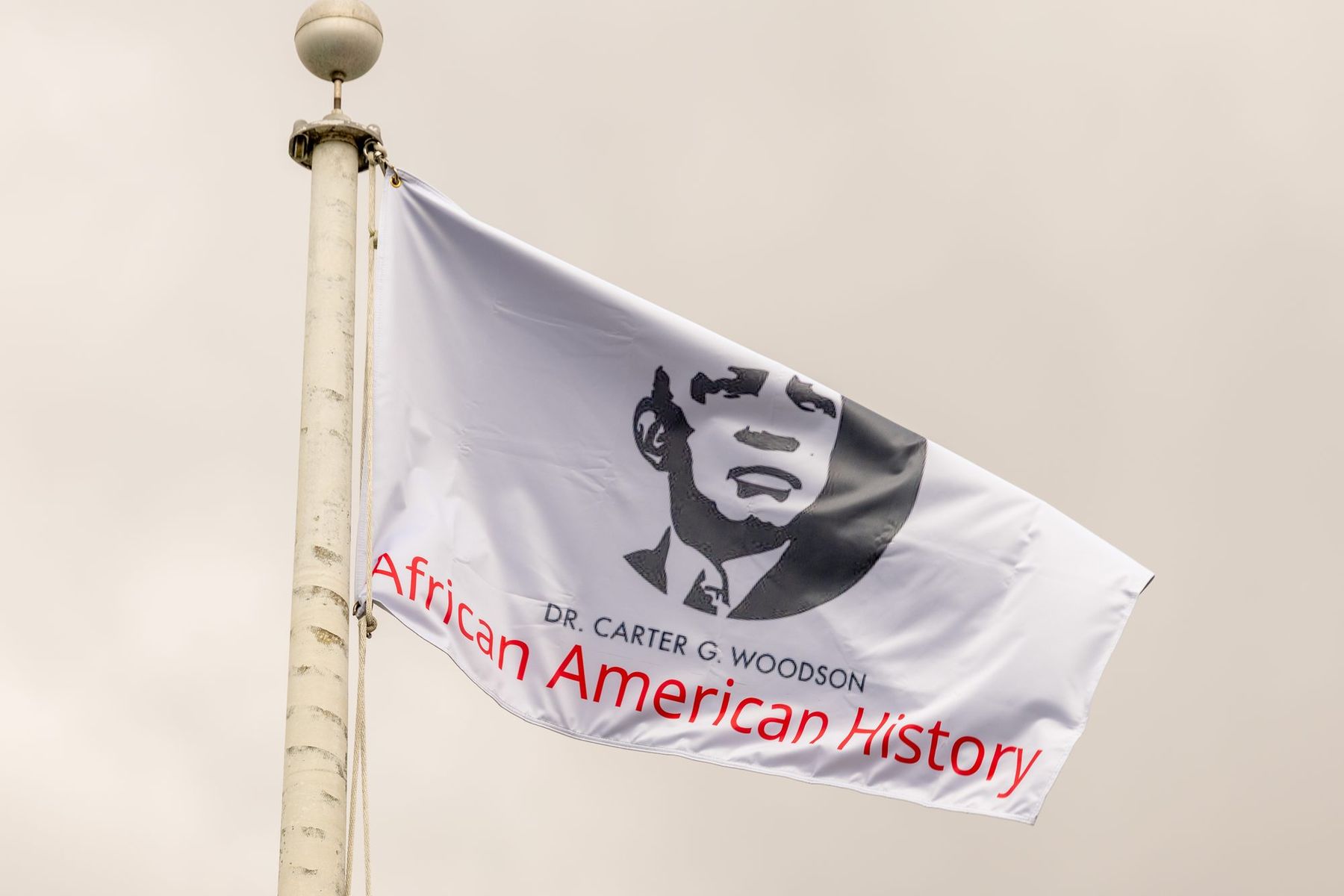 The African American History flag raised over Lafayette