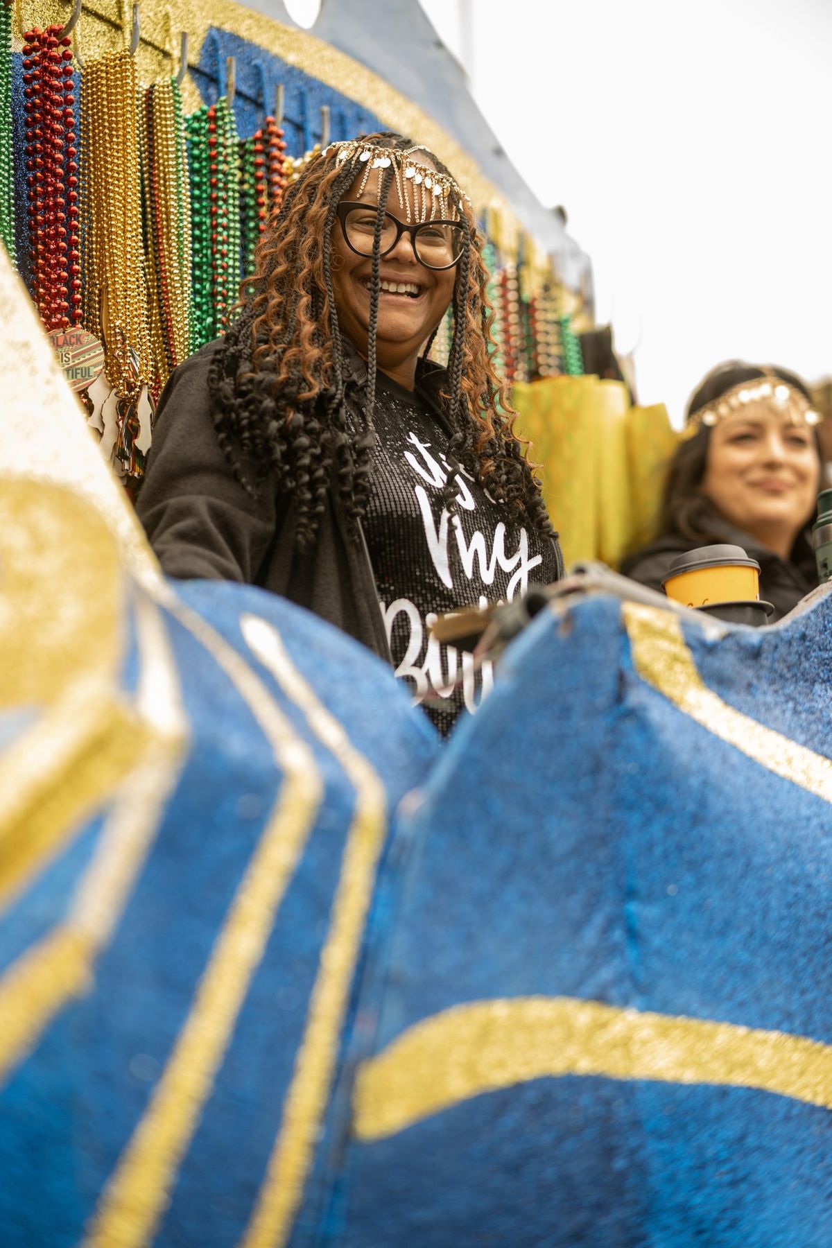 A rider with beads on a float