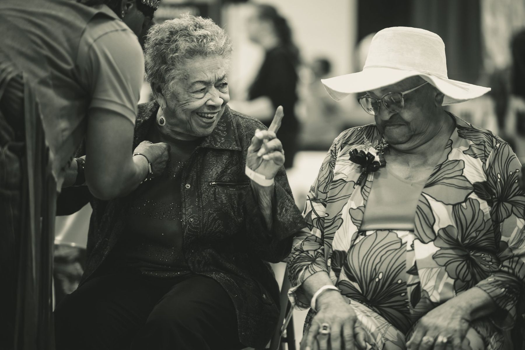 Two elders sharing a laugh