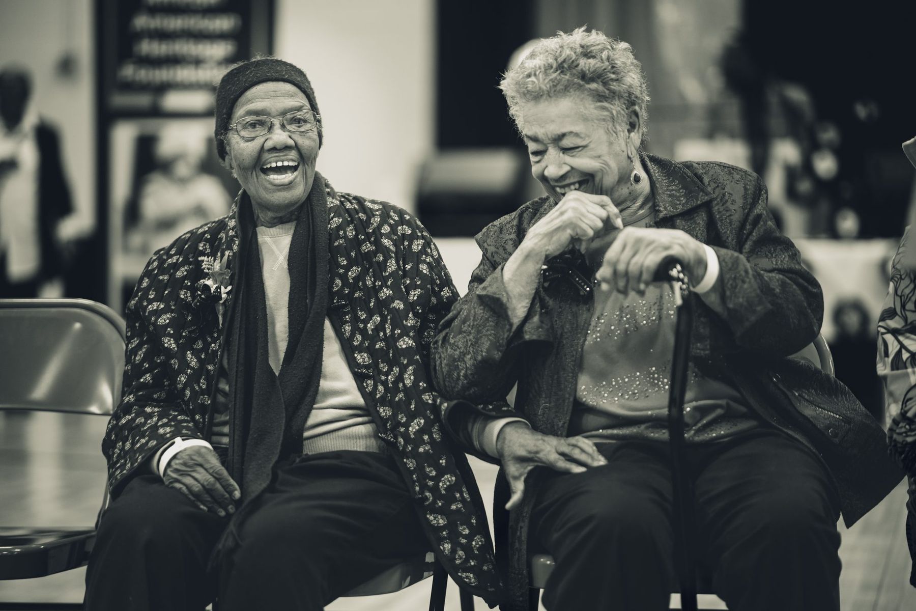 Two elders laughing together
