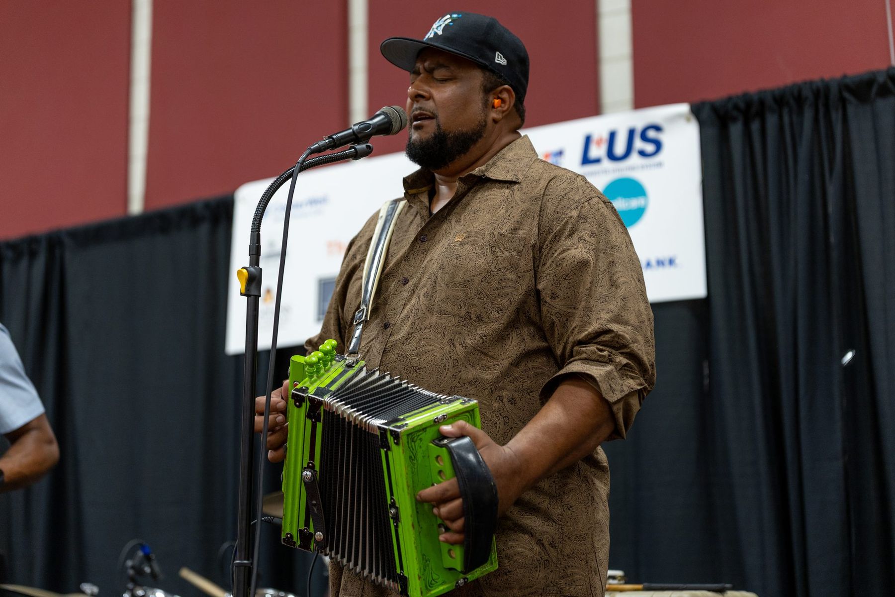 Zydeco accordion player on stage